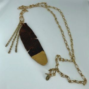 Leather and gold dipped feather necklace